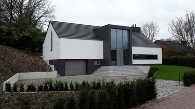 Restyling bestaande woning buitengevelisolatie met gepleisterde afwerking uitgevoerd door stucadoorsbedrijf R. Seuren.jpg